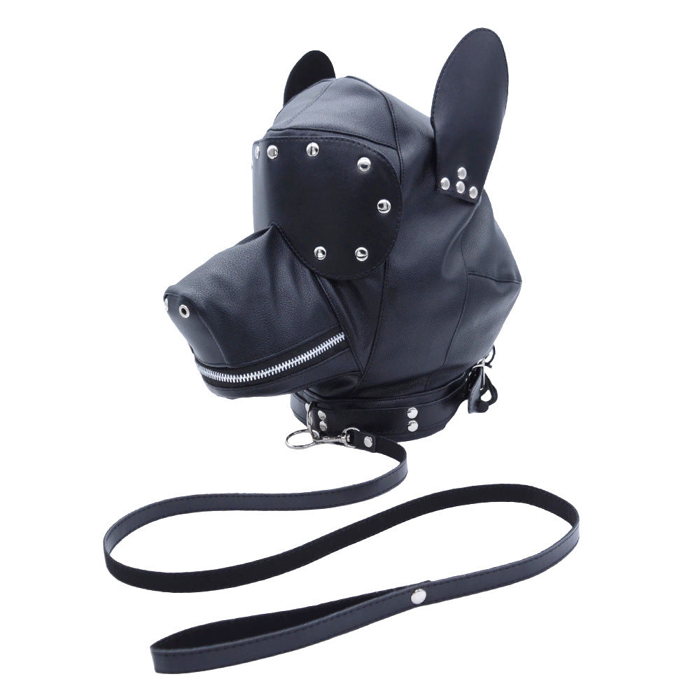 Three-quarter view of black puppy play hood with leash and silver-tone rivets