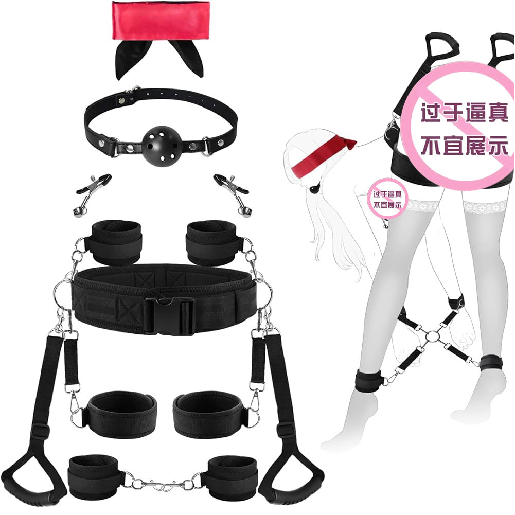 Black padded restraint system with thigh, wrist and ankle cuffs connected to a wide waist belt