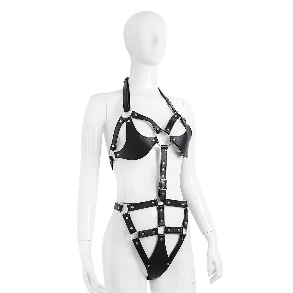 Side view of black harness bodysuit with connecting straps and hip panel