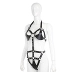 Black ring-detail harness bodysuit with adjustable waist and hip straps