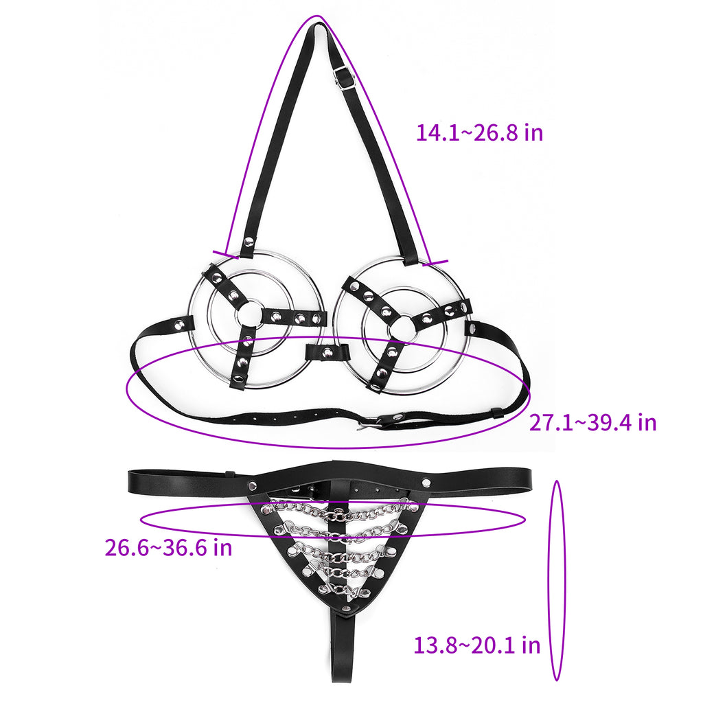 Angled view of black ring harness bra and chain-detail thong worn by model with censor overlays