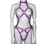 Purple ring-detail body harness with geometric hip straps on mannequin