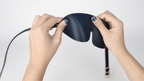 Flexible black PU leather blindfold demonstration