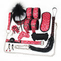 Complete metallic pink and black glossy PU leather bondage accessory kit