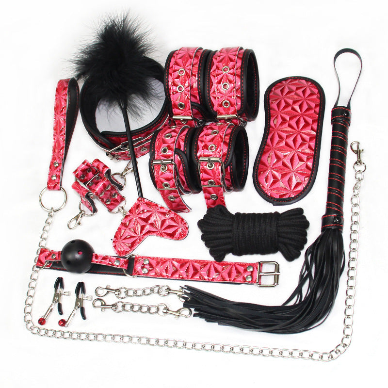 Complete metallic pink and black glossy PU leather bondage accessory kit