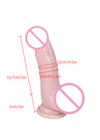 Flesh-tone curved suction-cup dildo shown horizontally with pink censorship overlays