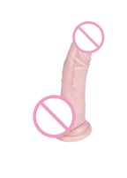Curved flesh-tone suction-cup dildo shown at an angle with pink censorship overlays