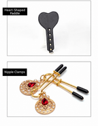 Black heart-shaped paddle and gold-tone jeweled nipple clamps