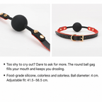 Adjustable black silicone ball gag with PU leather strap and gold-tone buckle