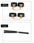 Black PU leather wrist and ankle cuffs with chains and matching flogger