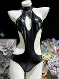 Glossy patent leather cutout bodysuit shown in an alternate red color