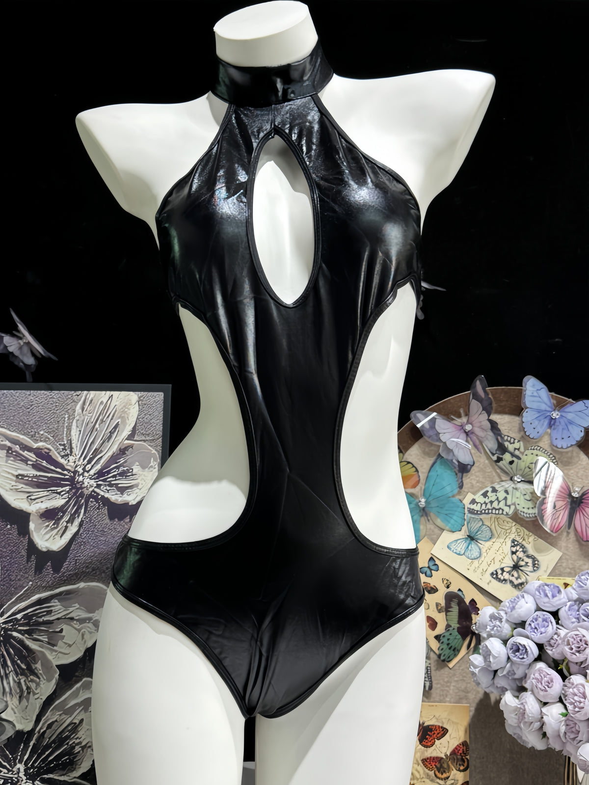 Glossy patent leather cutout bodysuit shown in an alternate red color